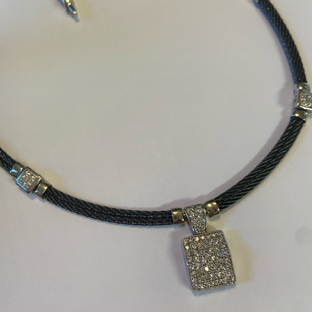 This is a David Webb diamond necklace and earrings